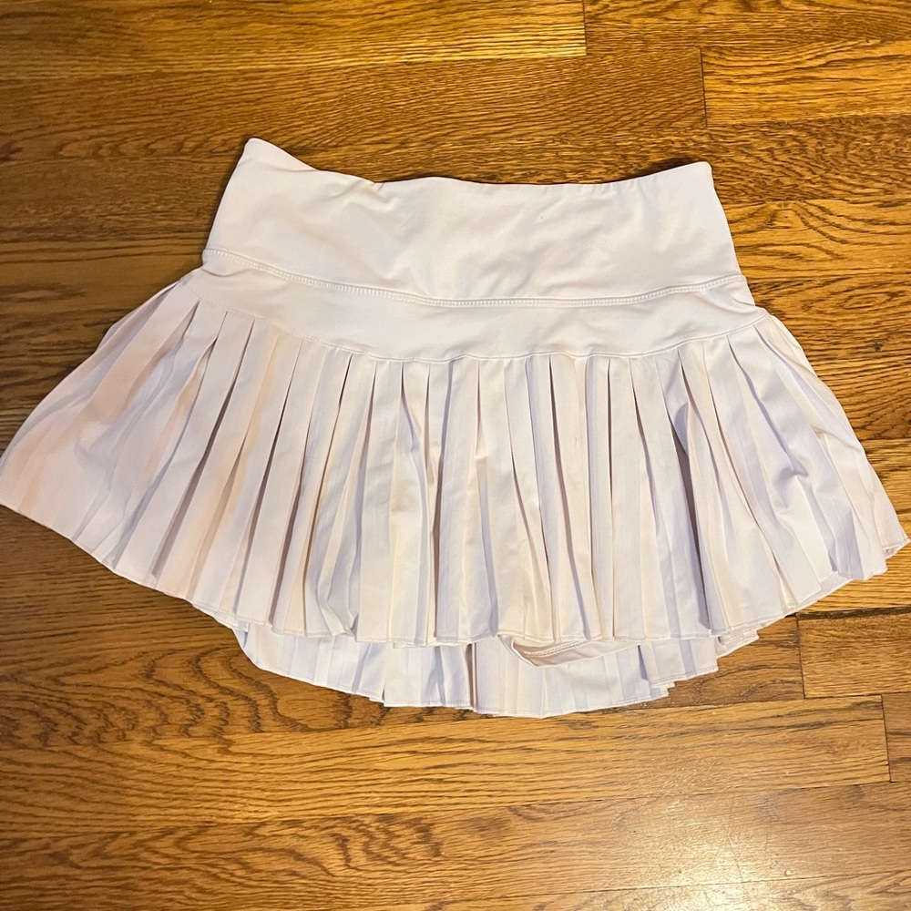 Gold hinge white skirt